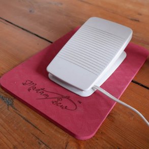 Underlag til symaskinepedal  